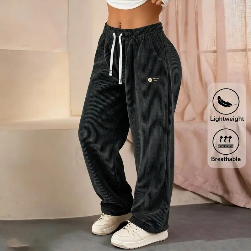 Black corduroy trousers
